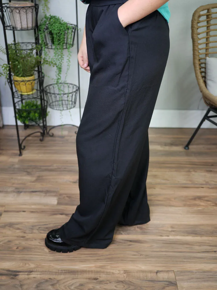 Pleated Wide Leg Pants in Black by Eesome